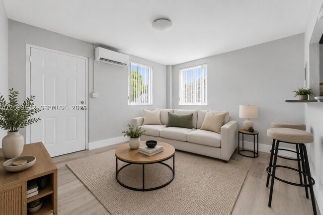 Building Photo - 6647 SW 59th St Unit 102
