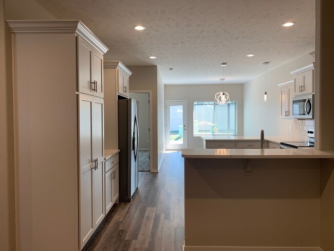 Photo - Zero entry ranch townhome with 2 stall garage. Laundry on main level, 2 bedrooms/2.5 bath in SE L...