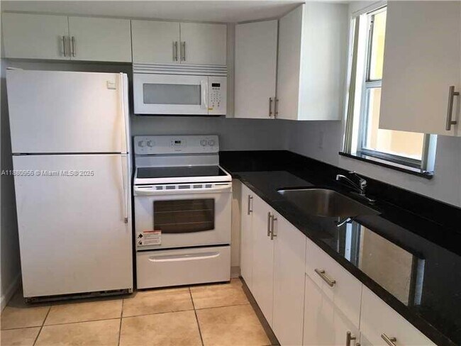 Building Photo - 9359 Fontainebleau Blvd Unit F308 Rental