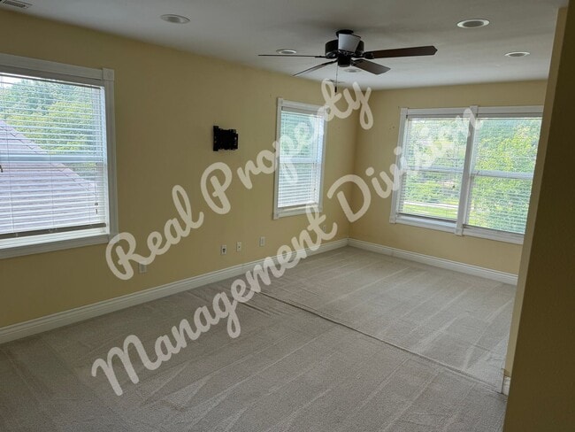 Photo - Spacious 3-Bed, 2-Bath Home with Fenced Yard in a Quiet Neighborhood