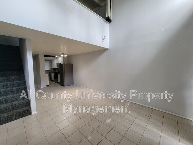 Building Photo - 703 SW 75th St Unit 101