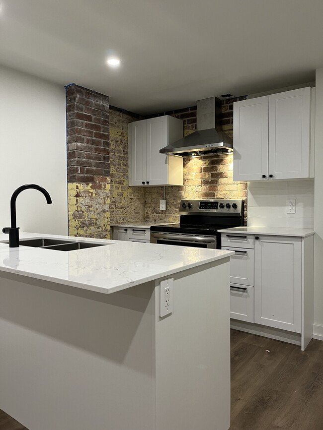 Building Photo - Modern 1-Bedroom Loft in the Heart of Downtown Orillia – Firehall Lofts Unit 105