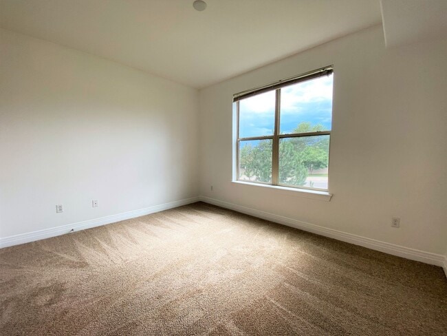 Photo - Stylish 1BD/1BA Condo with Garage & Balcony in Sought-After Englewood Location | $1,795/mo