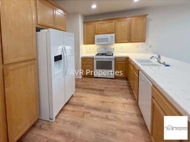 Photo - Spacious home with a large open concept kitchen, dining and living room