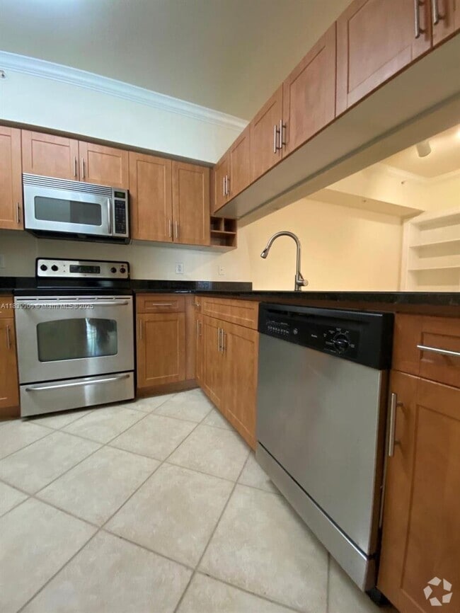 Building Photo - 6458 Emerald Dunes Dr Unit 108 Rental