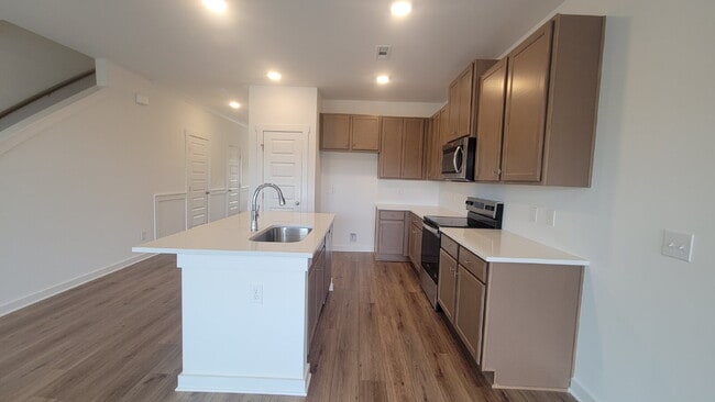 Photo - "Charming 3-Bed Oasis with Granite Elegance on Discovery Point Drive!"