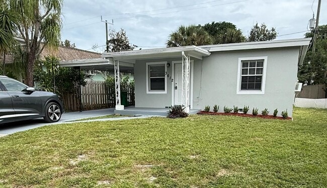 Building Photo - Charming 2/1 Single Family Home with large carport