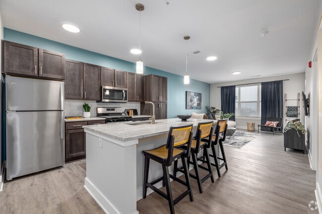 A - 1BR, 1BA - 859SF - Kitchen - McDowell Point 55+ Active Adult Apartment ...