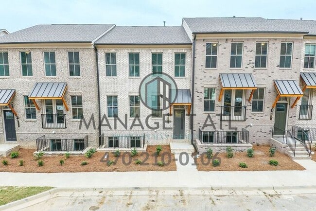 Building Photo - Elegant 4 Bedroom Townhome in Prime Location in Dorvaville