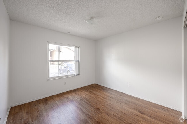 3BR, 2BA - 1,140SF - Primary Bedroom