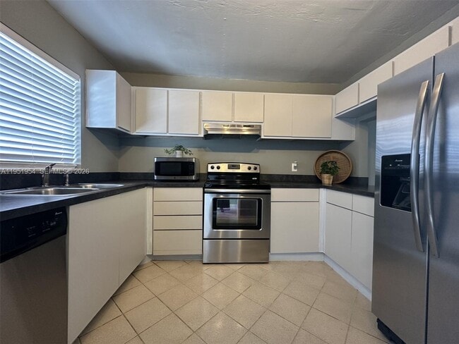 Photo - 9450 Live Oak Pl Unit 303