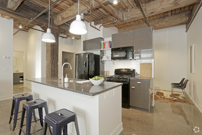 Dream Kitchens w/modern appliances, dishwashers & huge granite island counter tops - The Otis