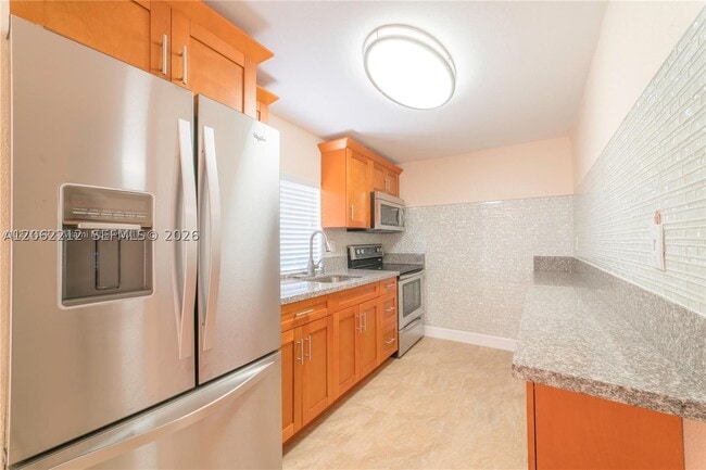 Building Photo - 4350 SW 1st St Unit Rear
