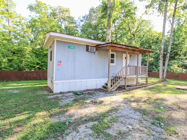 Building Photo - Charming Tiny Home in Peaceful Country Set...