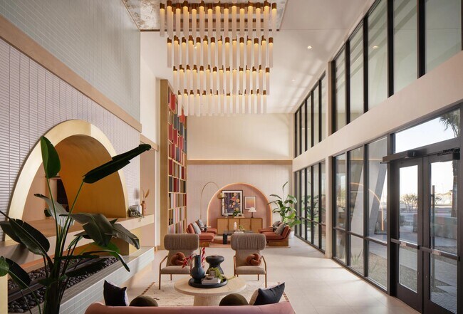 Soaring ceilings, curated desert details, and light-filled spaces set the tone at Modera Rio Salado. - Modera Rio Salado