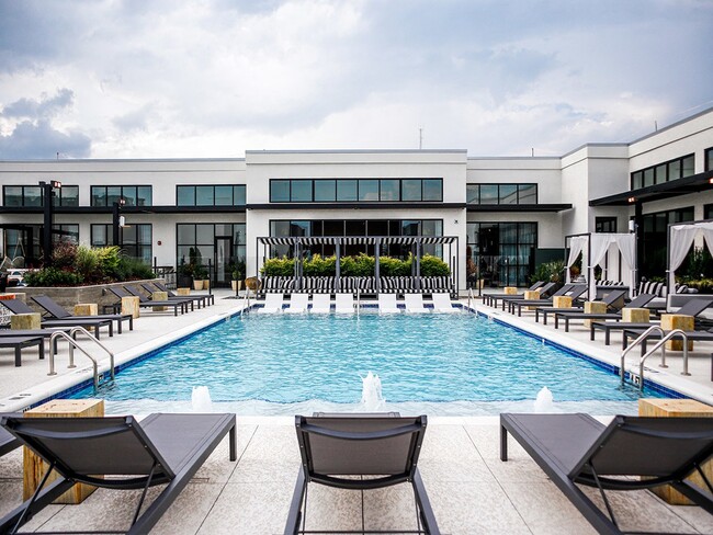 Resort-Style Rooftop Pool and Sundeck - Sentral West Midtown at Star Metals Apartments