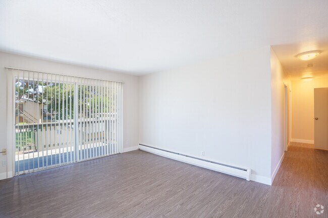 2BR, 1BA - 785SF - The Wildflower - Living Room - Garden Village Apartments