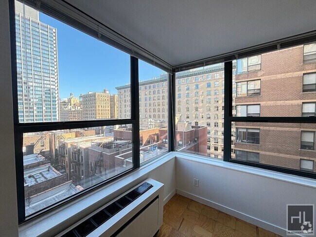 Building Photo - HUGE NO-FEE 1 BED WITH BEAUTIFUL VIEWS IN ... Unit 5E Rental