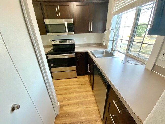 Photo - Large Updated 2 Bed, 1.5 Bath Townhouse w/ Washer & Dryer + Off-street Parking