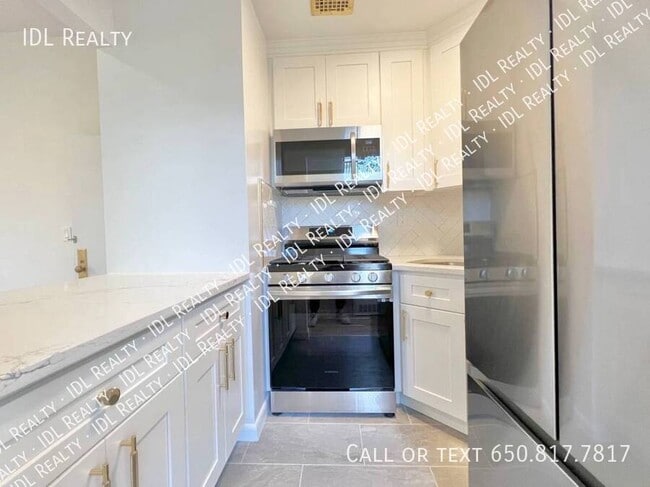 Building Photo - 8621 Bay 16th St Unit 3