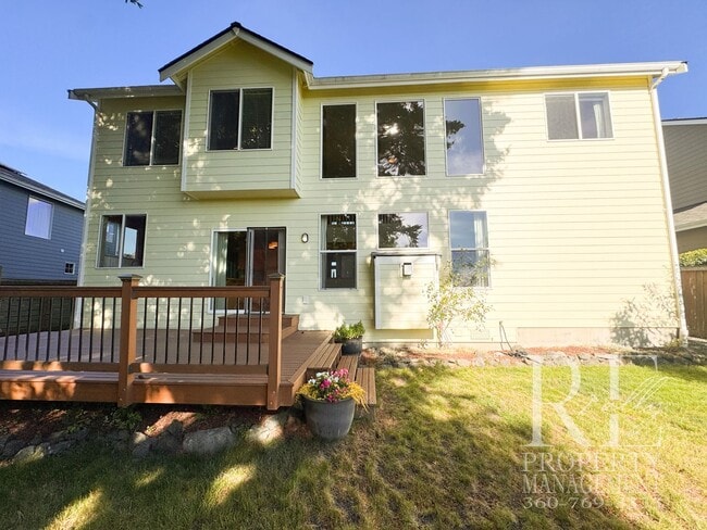 Building Photo - Luxury Poulsbo View Home with Vaulted Ceilings, Expansive Deck & Stunning Natural Light