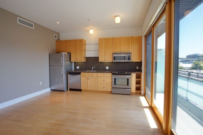 Photo - Slabtown: Beautiful One-Bedroom with Condo Finishes + W/D! Unidad 402
