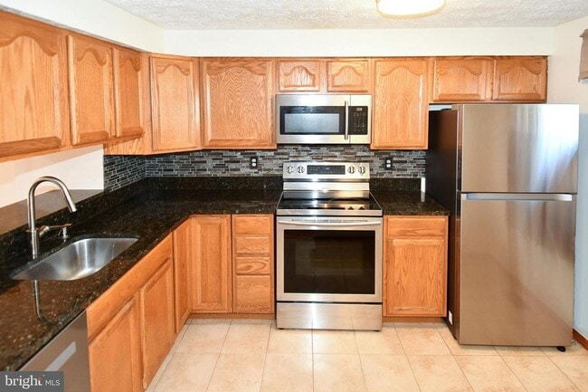 Photo - This bright and updated three level townhouse in Springfield offers a welcoming blend of style an...