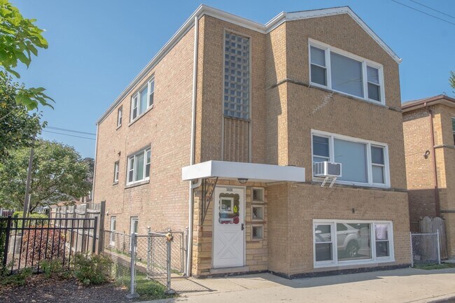 Building Photo - 5520 S Pulaski Rd Unit G