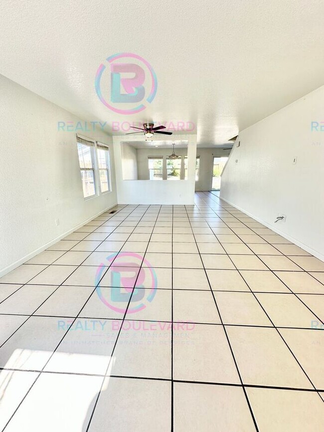 Photo - Gorgeous 4BR Home with Granite Counters, Open-Concept Living & 2 car garage