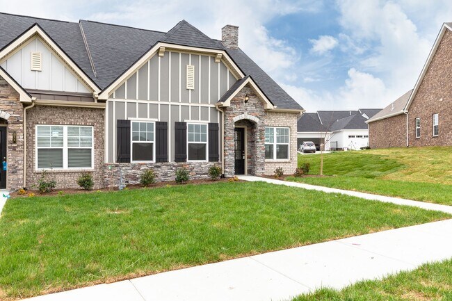 Photo - **BE THE LUCKY ONE TO LIVE IN THIS 2022-BUILT UPSCALE COTTAGE HOME IN THE PRESERVE AT BELLE POINTE**