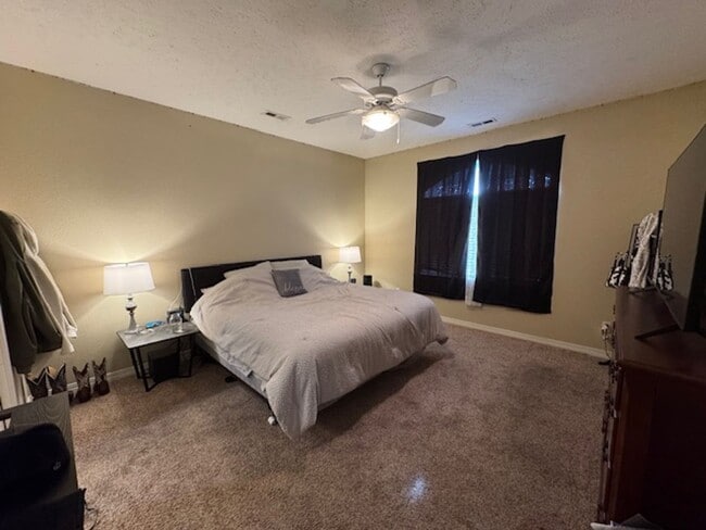 Photo - Bright & Spacious 2-Bed Townhome in great neighborhood with attached 2-car Garage!