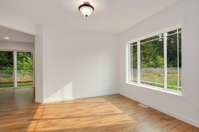 Photo - Modern Luxury: Spacious 3-Bedroom Home Near JBLM