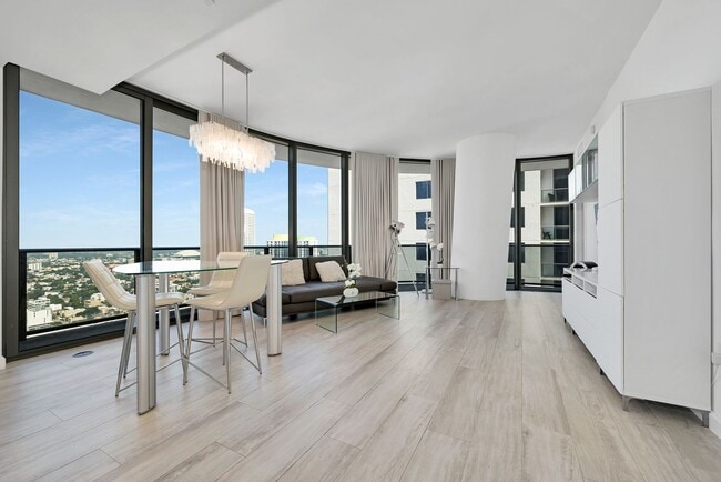 Building Photo - Remarks:	Enjoy stunning Skyline and Bay views from the wraparound balcony of this furnished 2-bed...