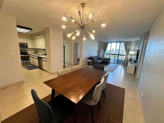 Building Photo - 3600 Mystic Pointe Dr Unit 1510