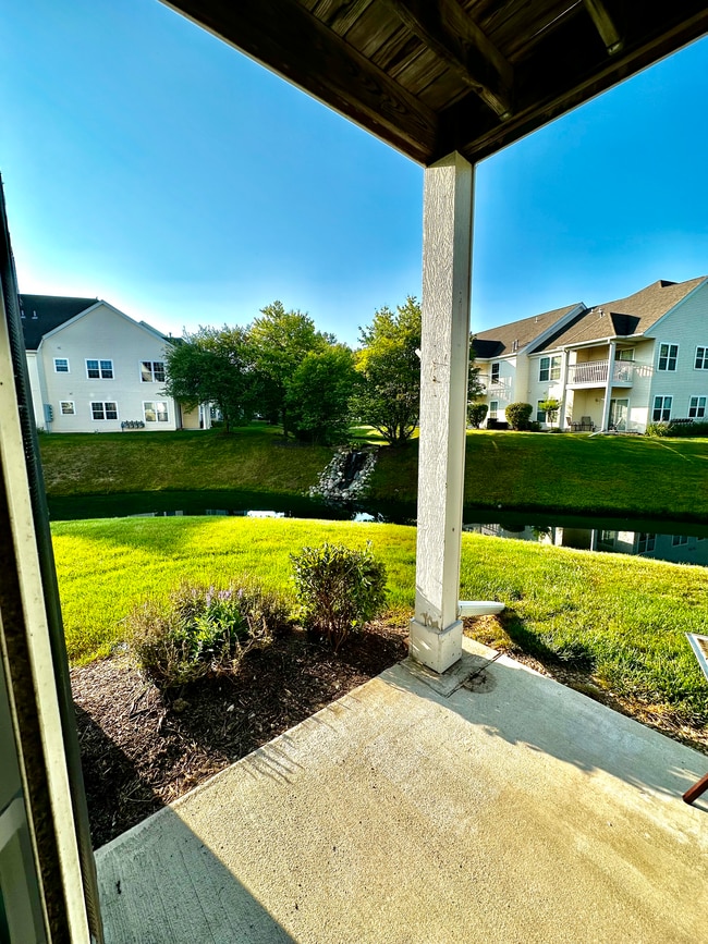 Patio with pond/waterfall - 955 Misty Glen Dr Condo Unit 955