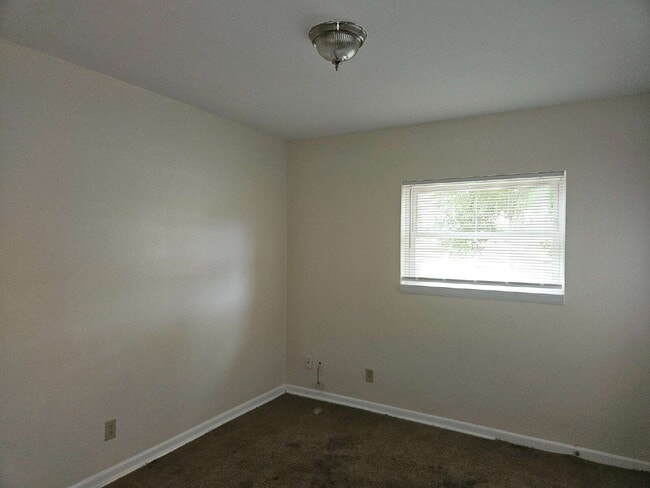 Photo - "Charming 4-Bed Home with Spacious Layout