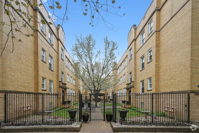Building Photo - 1338.5 W Estes Ave Unit 2N Rental