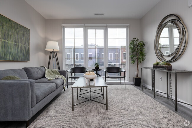 2BR, 2BA - 1055SF - Living Room - Axis 201