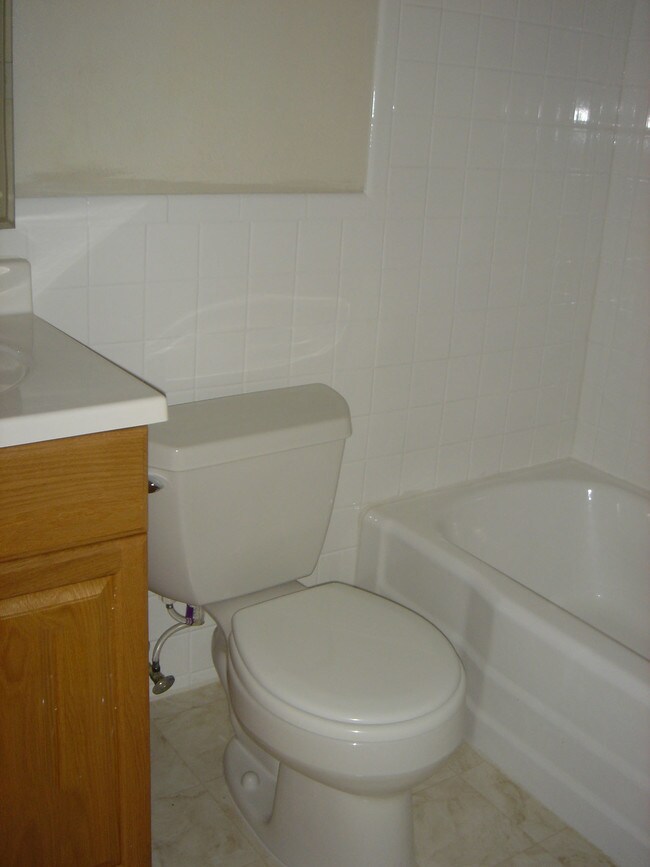 Baño - TriLux Apartments