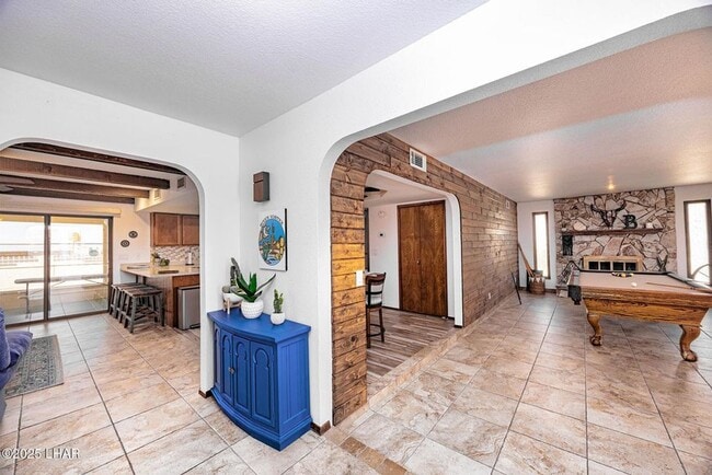 Photo - 12 month lease. Fully Furnished 3-Bedroom, 2-Bath Home with Billiard Room & Backyard Entertaining...