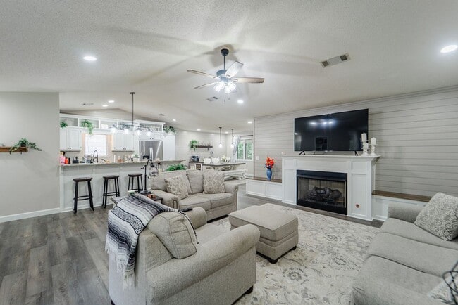 Photo - Charming 4 bedroom, 3 bathroom with lots of outdoor living space.