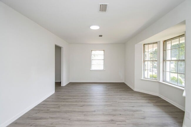 Photo - Welcome to a beautifully maintained 4-bedroom, 2-bathroom home located in the highly sought-after...