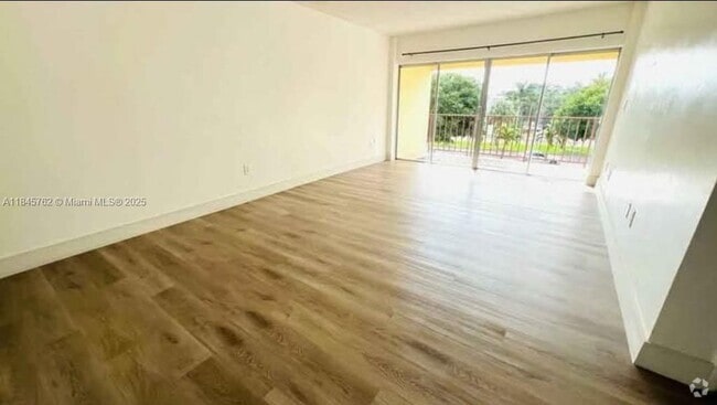 Building Photo - 8775 Park Blvd Unit 306 Rental