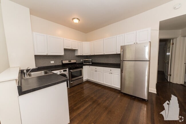Building Photo - 1421 W Hutchinson St Unit 1415-1417-GDN Rental