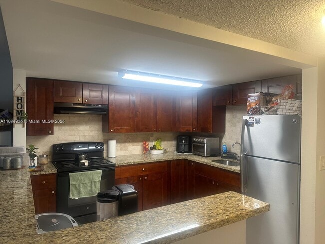 Building Photo - 11131 Royal Palm Blvd Unit 8 Rental