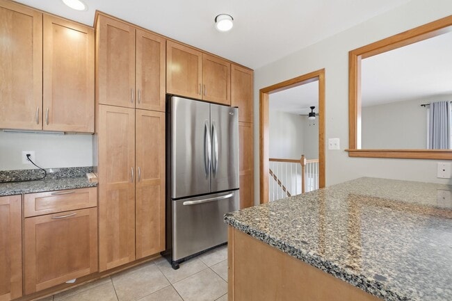 Photo - 5BR / 3BA Home with Flexible Living Space & Tree-Lined Views