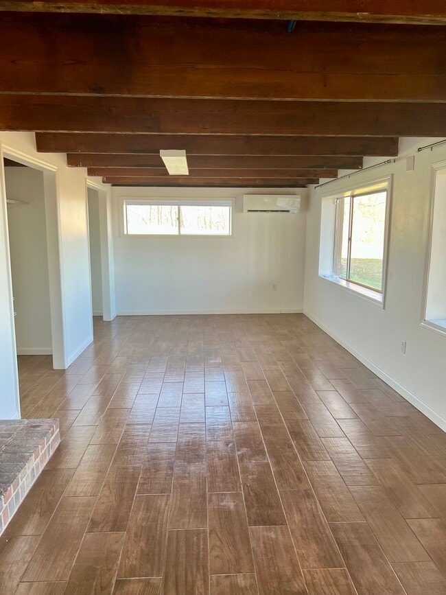 Bedroom with two closets and three large window - 8442 McCrory Ln Unit 1