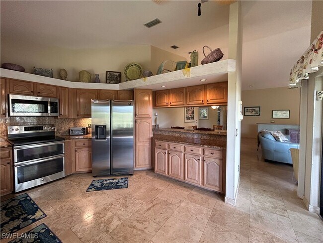 Photo - 16540 Heron Coach Way Unit 405