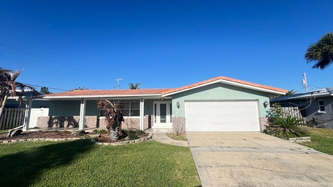 Building Photo - IMMACULATE 4 Bedroom, 2 Bathroom Home in Cocoa Beach!! ONLY MINUTES from the Beach!! (Lawn Care I...