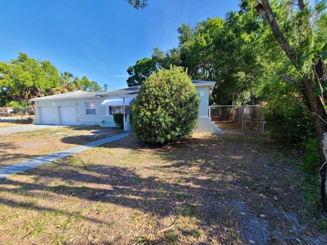 Photo - Stunning Corner-Lot Rental: 4BR/2BA with Courtyard